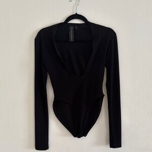 Norma Kamali plunge neck Black Long Sleeve Bodysuit